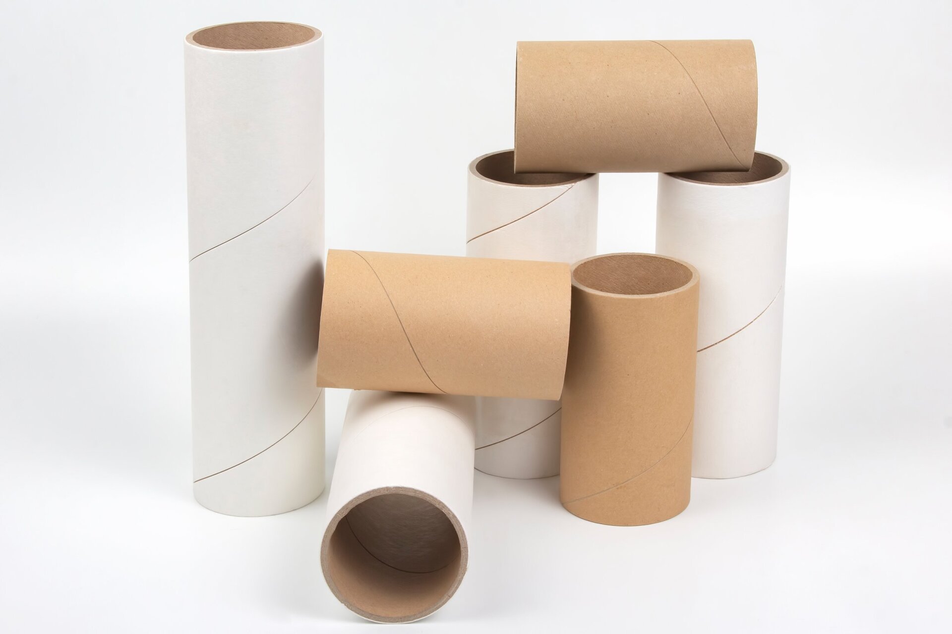 Custom white and kraft paper tubes compared side by side